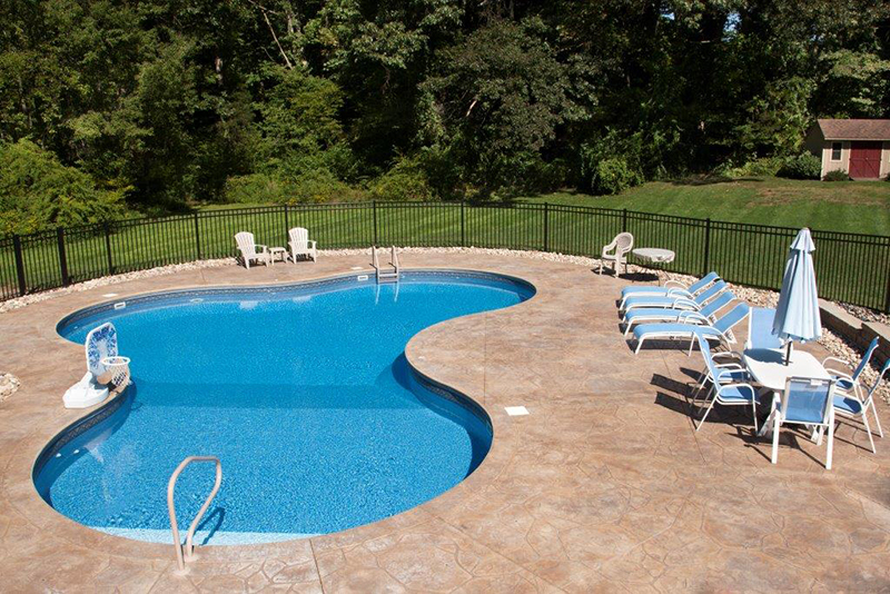 Swimming pool and stamped concrete project example 61